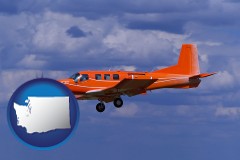 washington map icon and a red turboprop aircraft flying in a blue sky with cumulus clouds